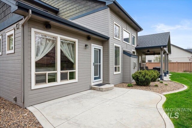 4824 S Longmoor Ave, Boise, ID 83709 - back of house featuring a patio and fence