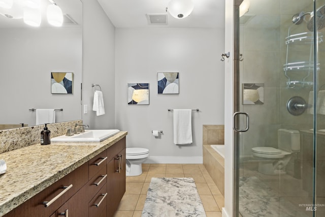 bathroom with visible vents, toilet, a stall shower, vanity, and tile patterned floors