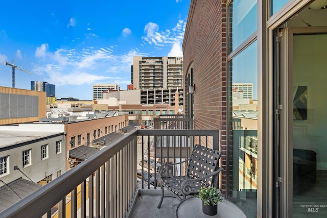 balcony featuring a city view