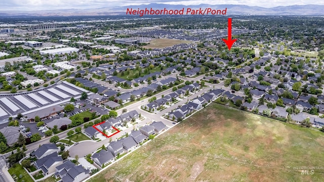 aerial view of property's location featuring property boundaries highlighted and a mountain backdrop