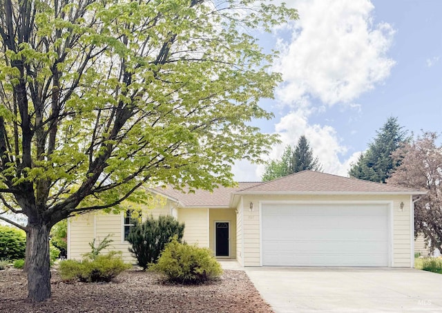 1937 E Vandal Dr, Moscow, ID 83843 - ranch-style home with driveway and an attached garage