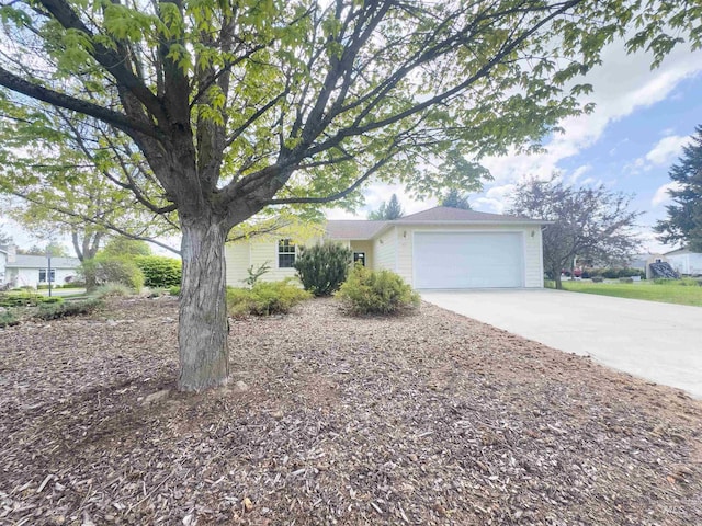 1937 E Vandal Dr, Moscow, ID 83843 - view of property exterior with concrete driveway and an attached garage
