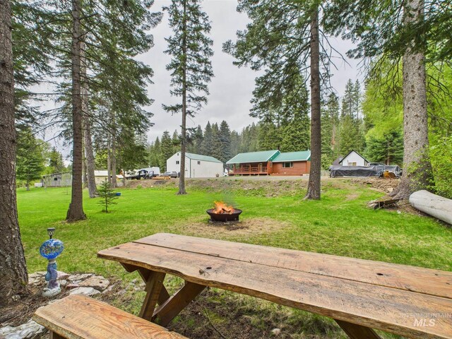 4474 Council Cuprum Rd, Council, ID 83612 - view of green lawn with a fire pit