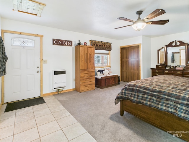 4474 Council Cuprum Rd, Council, ID 83612 - bedroom with heating unit, a closet, light tile patterned floors, ceiling fan, and baseboards