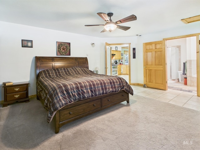 4474 Council Cuprum Rd, Council, ID 83612 - tiled bedroom with carpet floors, ensuite bathroom, baseboards, and ceiling fan