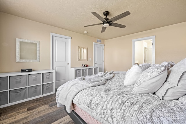 16848 Loggia Ave, Caldwell, ID 83607 - bedroom with dark wood-type flooring, a textured ceiling, and ceiling fan