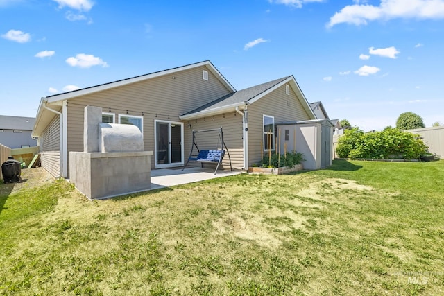16848 Loggia Ave, Caldwell, ID 83607 - back of property featuring a patio area