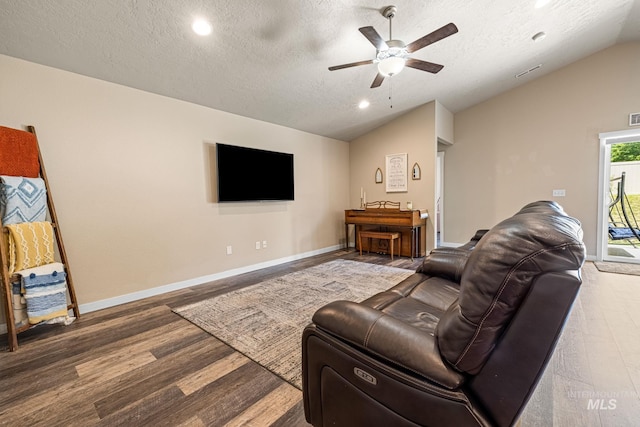 16848 Loggia Ave, Caldwell, ID 83607 - living area featuring lofted ceiling, a ceiling fan, a textured ceiling, wood finished floors, and recessed lighting