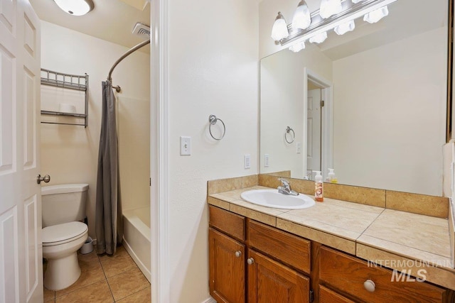 646 W Falls Ave, Twin Falls, ID 83301 - full bathroom featuring tile patterned floors, vanity, and shower / tub combo