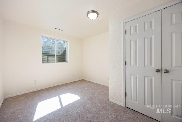 646 W Falls Ave, Twin Falls, ID 83301 - unfurnished bedroom with carpet floors and baseboards