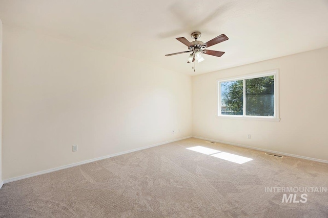 646 W Falls Ave, Twin Falls, ID 83301 - carpeted empty room with baseboards and a ceiling fan