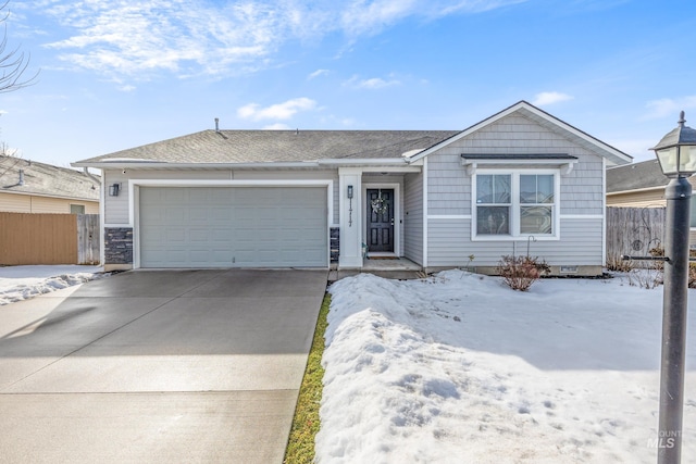 single story home featuring a garage