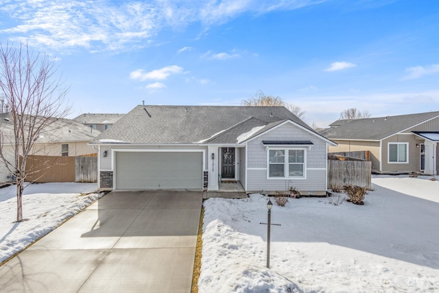 single story home featuring a garage