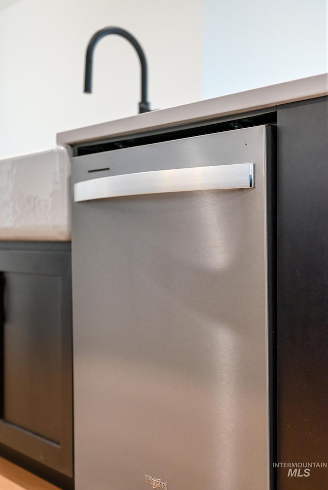 2386 N Leatherwood Ave, Star, ID 83669 - kitchen view of dishwasher and gray cabinets