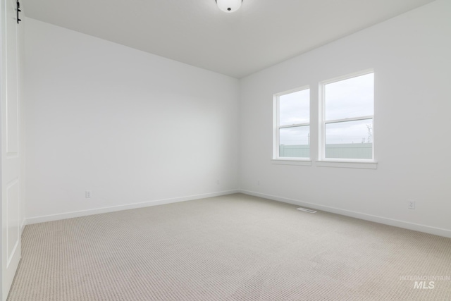 2386 N Leatherwood Ave, Star, ID 83669 - spare room featuring light colored carpet and baseboards