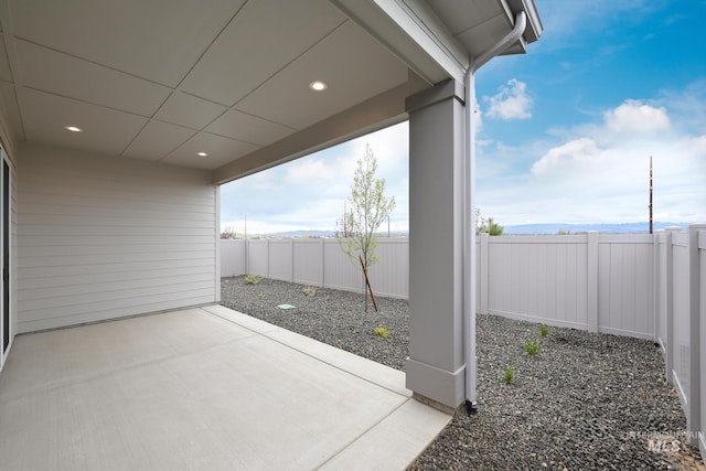 2386 N Leatherwood Ave, Star, ID 83669 - fenced backyard with a patio area