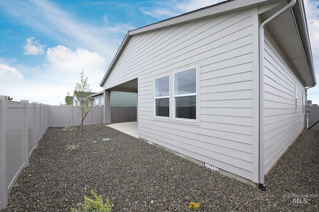 2386 N Leatherwood Ave, Star, ID 83669 - view of property exterior with a fenced backyard and a patio