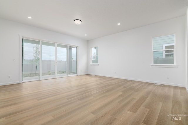 2386 N Leatherwood Ave, Star, ID 83669 - empty room featuring light wood-style floors, baseboards, and recessed lighting
