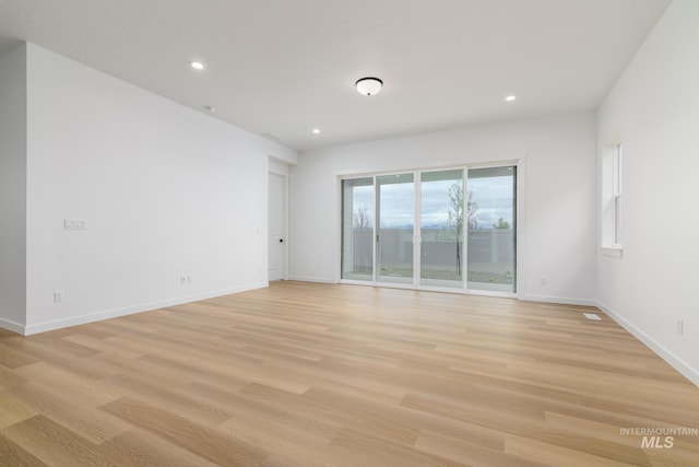 2386 N Leatherwood Ave, Star, ID 83669 - spare room with recessed lighting, light wood-style flooring, and baseboards