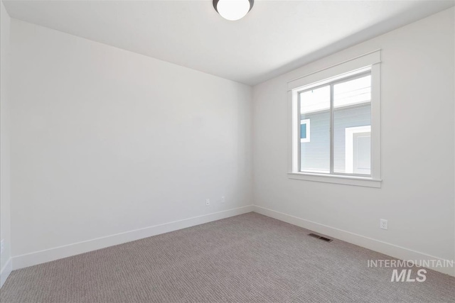 1469 E Andes Dr, Kuna, ID 83634 - unfurnished room featuring carpet floors and baseboards