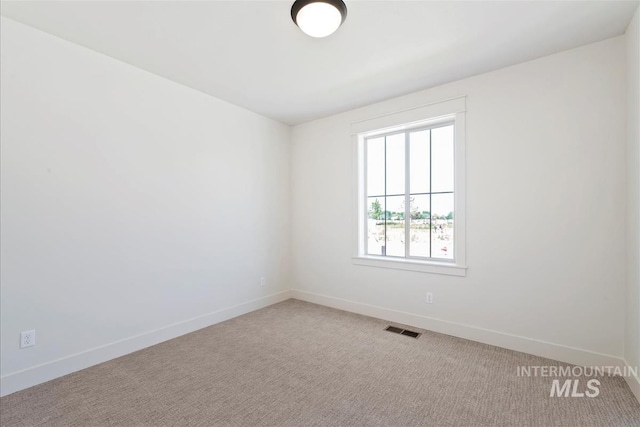 1469 E Andes Dr, Kuna, ID 83634 - spare room featuring baseboards and carpet floors