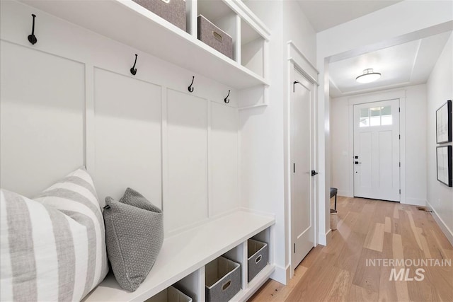 1469 E Andes Dr, Kuna, ID 83634 - mudroom with light wood finished floors and baseboards