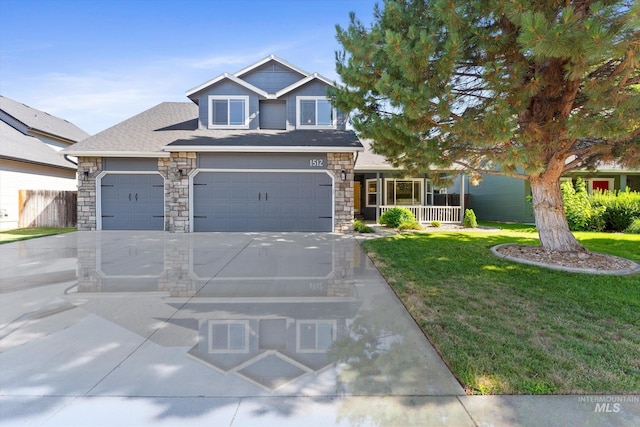 craftsman-style home with covered porch and a front yard