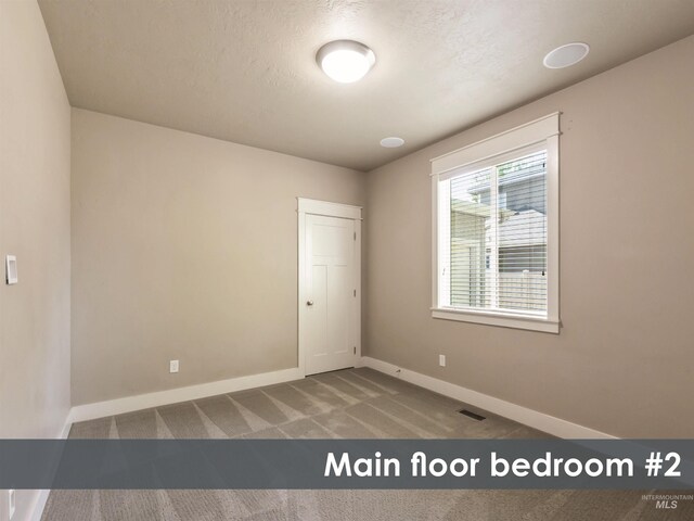 1014 E Carter St, Boise, ID 83706 - unfurnished bedroom featuring baseboards and carpet