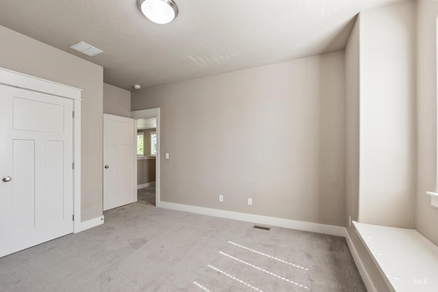 1014 E Carter St, Boise, ID 83706 - unfurnished bedroom with light colored carpet and baseboards