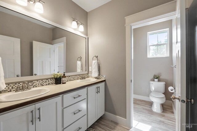1014 E Carter St, Boise, ID 83706 - full bath with double vanity and wood finished floors