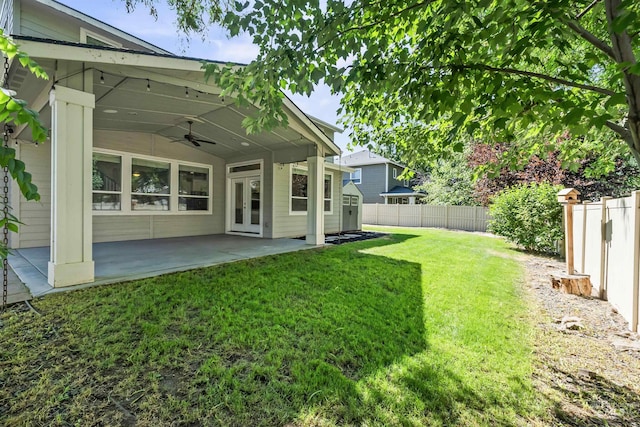 1014 E Carter St, Boise, ID 83706 - fenced backyard with ceiling fan and a patio