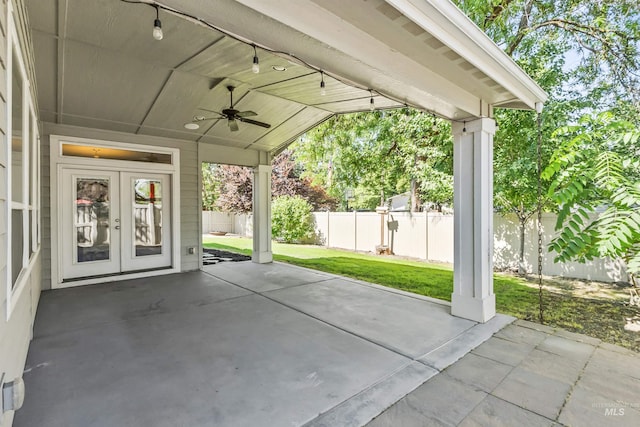 1014 E Carter St, Boise, ID 83706 - fenced backyard featuring a ceiling fan, french doors, and a patio