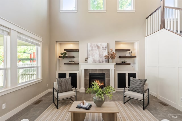 1014 E Carter St, Boise, ID 83706 - living area featuring a high ceiling and a tiled fireplace