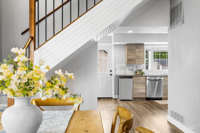 1936 S Leadville, Boise, ID 83706 - bar with dishwasher, wood finished floors, recessed lighting, decorative backsplash, and refrigerator