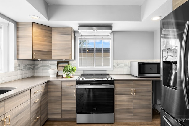 1936 S Leadville, Boise, ID 83706 - kitchen featuring stainless steel appliances, tasteful backsplash, recessed lighting, light countertops, and modern cabinets