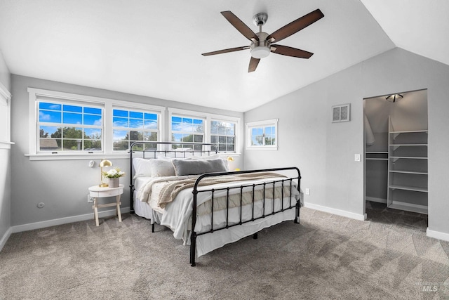 1936 S Leadville, Boise, ID 83706 - carpeted bedroom featuring vaulted ceiling, baseboards, a ceiling fan, and a walk in closet