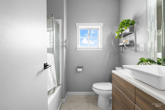 1936 S Leadville, Boise, ID 83706 - bathroom with marble finish floors, toilet, vanity, baseboards, and a shower
