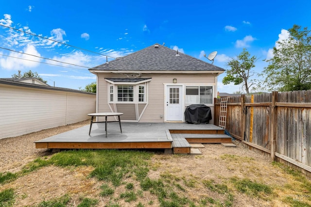 1936 S Leadville, Boise, ID 83706 - back of property featuring a shingled roof and a wooden deck