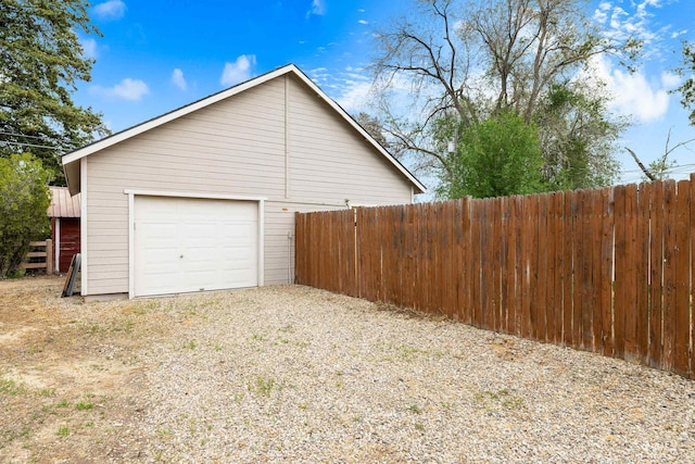 1936 S Leadville, Boise, ID 83706 - view of home's exterior featuring fence, a garage, and an outbuilding