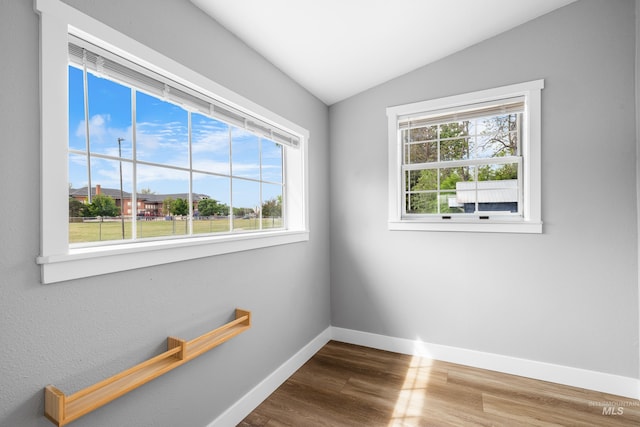 1936 S Leadville, Boise, ID 83706 - unfurnished room with baseboards, vaulted ceiling, and wood finished floors