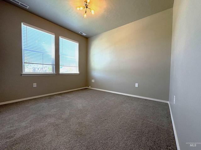 1786 E Cave Falls St, Kuna, ID 83634 - spare room with carpet floors and baseboards