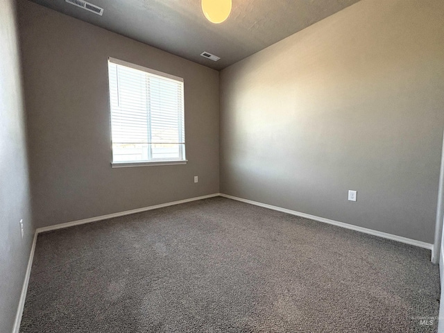 1786 E Cave Falls St, Kuna, ID 83634 - carpeted spare room with baseboards