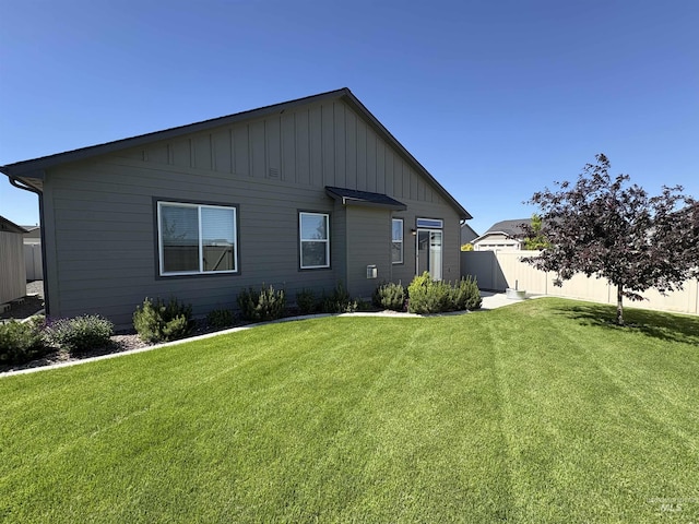 1786 E Cave Falls St, Kuna, ID 83634 - back of property with board and batten siding