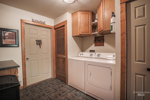 1102 Davis, Mccall, ID 83638 - laundry room with washing machine and dryer, cabinet space, and a textured ceiling