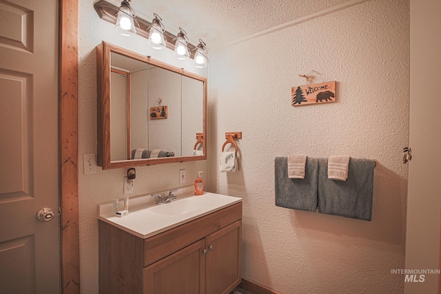 1102 Davis, Mccall, ID 83638 - bathroom with vanity and a textured wall