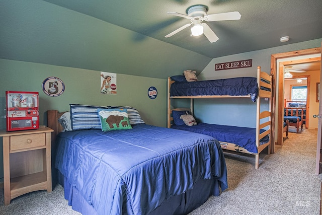 1102 Davis, Mccall, ID 83638 - bedroom featuring carpet flooring, vaulted ceiling, and ceiling fan