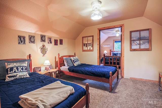 1102 Davis, Mccall, ID 83638 - bedroom with vaulted ceiling, carpet flooring, a textured wall, a ceiling fan, and a textured ceiling