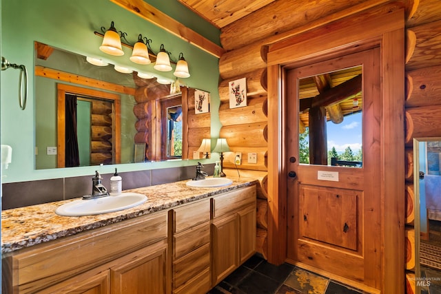 bathroom with log walls and vanity