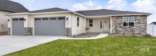 ranch-style house with a garage and a front yard