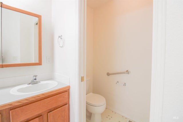 636 N Sterling St, Nampa, ID 83651 - bathroom with toilet and vanity